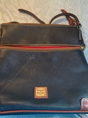 Dooney & Bourke Black Pebbled Leather Crossbody with Brown Trim and Red Zip